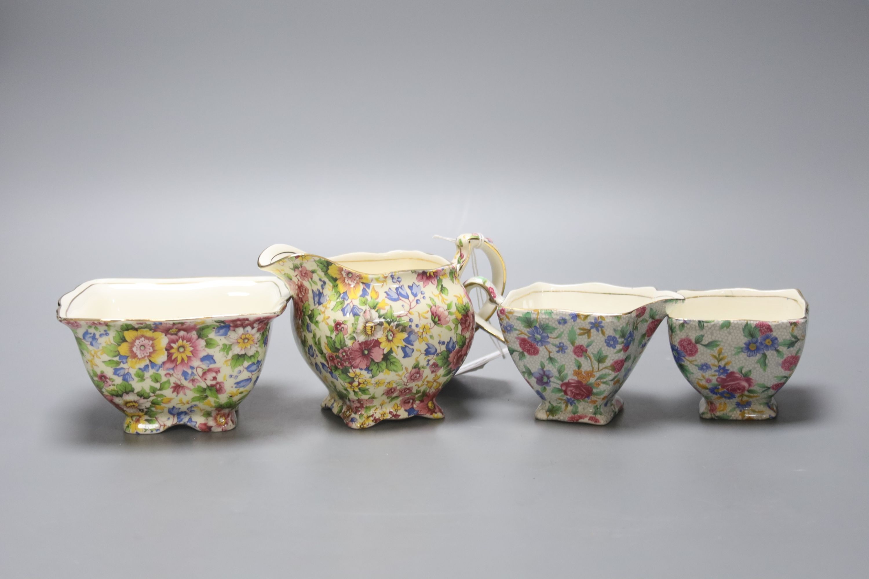 A group of Royal Winton Old Cottage Chintz pattern wares and an English porcelain dessert plates